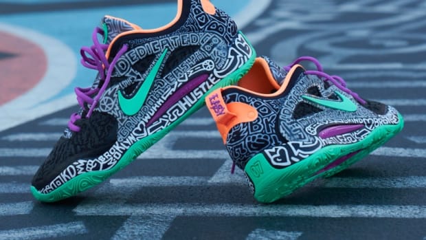 View of black and green Nike KD shoes.